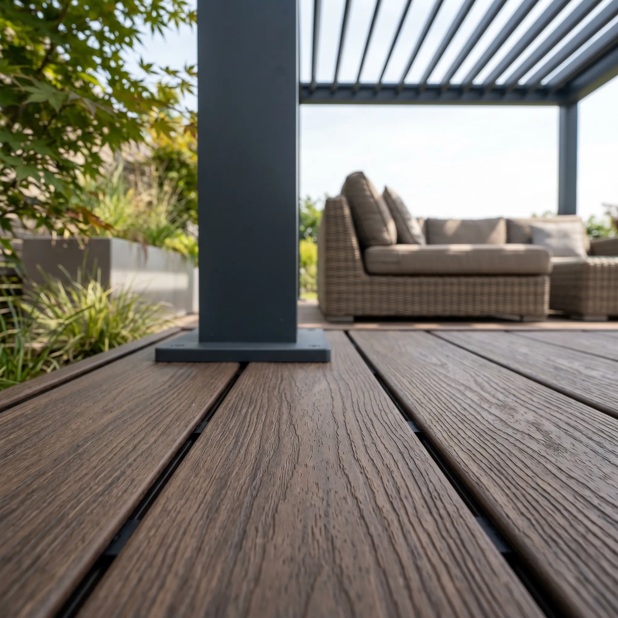 close-up of composite decking beneath an aluminium pergola