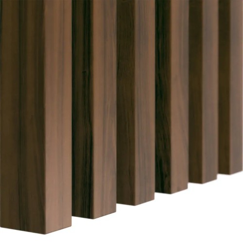 Vertical walnut-coloured wall slats with the wood texture visible.