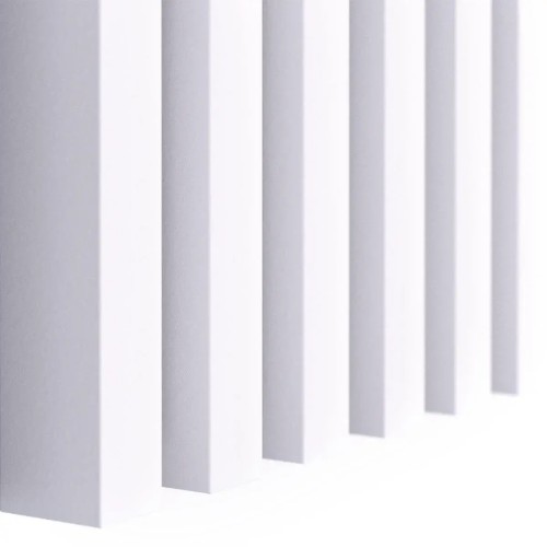 Vertical white wall slats viewed at an angle, showing the profile and depth of the decorative strips.