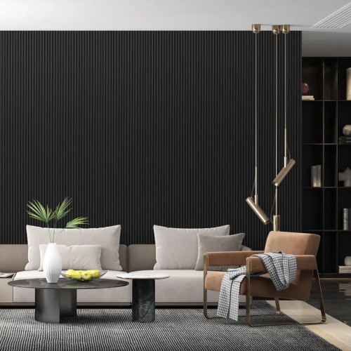 Black fluted panel on the wall of a modern living room with a beige sofa and a brown armchair.