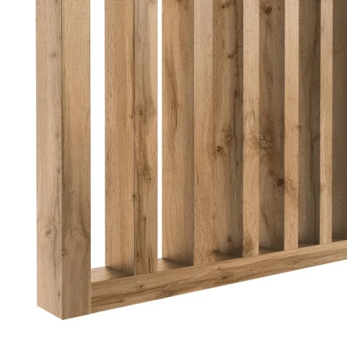 Close-up of the fixing for vertical slats in the bottom rail of a screen in Wotan oak.