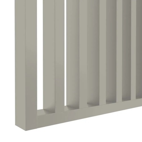 Detail of the bottom of an openwork screen made from vertical cashmere-coloured slats.